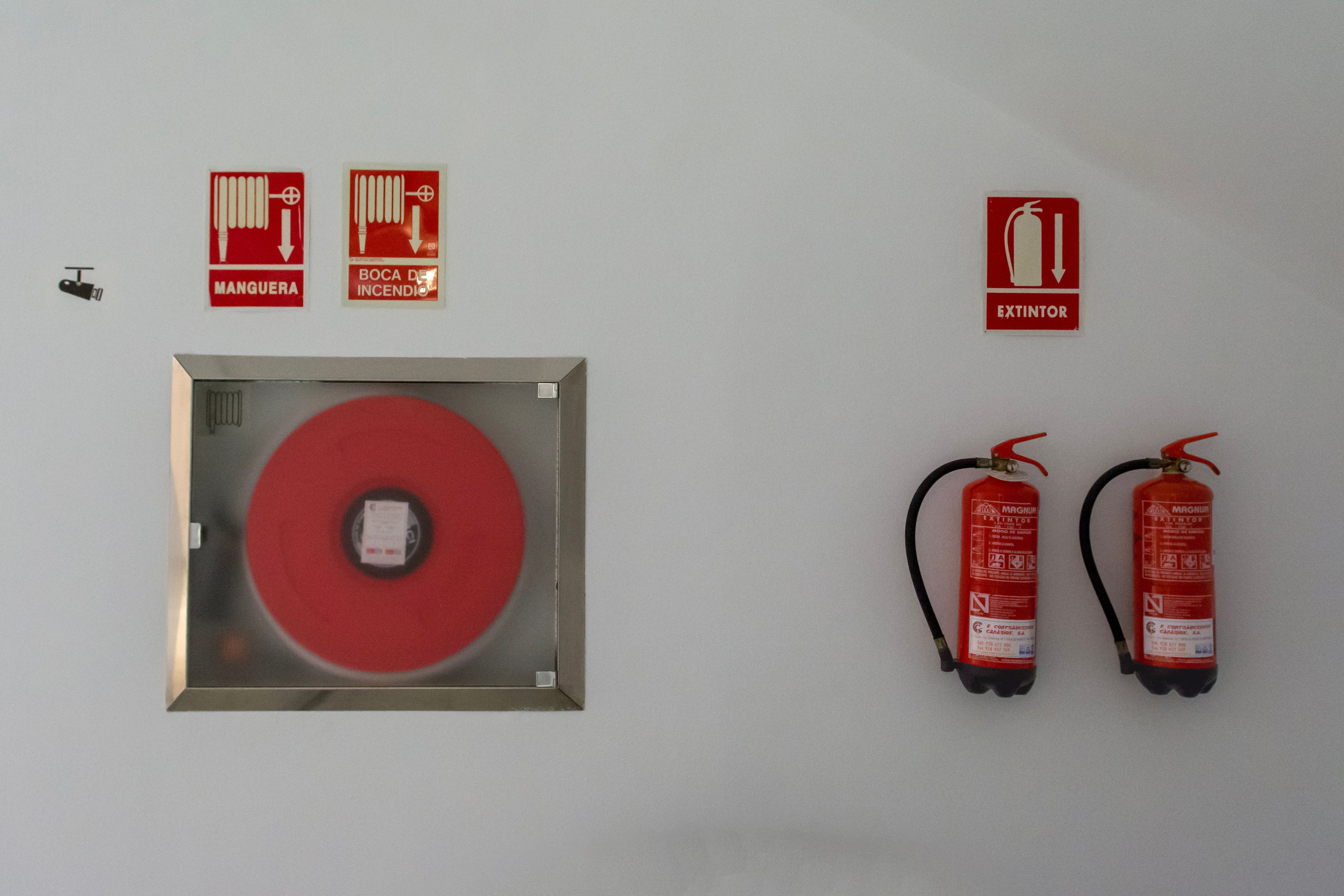 Burglar alarm control panel being installed